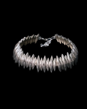 HUMAN OBJECT THISTLE CHOKER